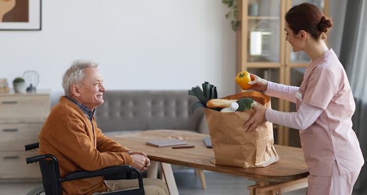 Person cleaning a kitchen counter